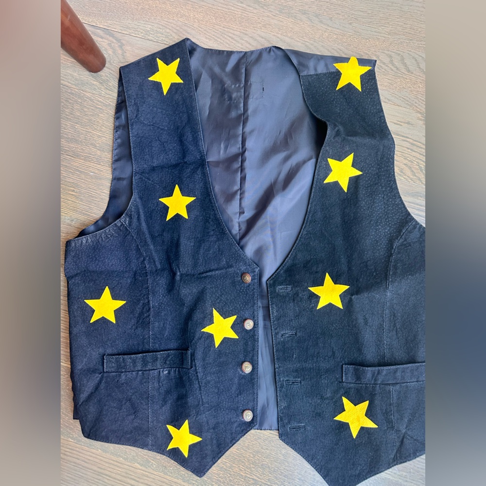 Black Vest with Yellow Star Accents